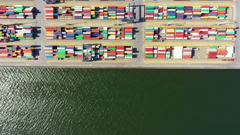 Container ship in import export and business logistic, By crane, Trade Port, Shipping cargo to harbor, International transportation, Business logistics concept, Aerial view