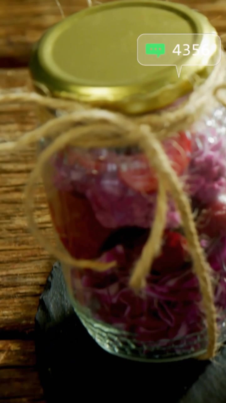 Vertical video: Jar coming from blur as focus shifting, badges floating, updating counts, promoting