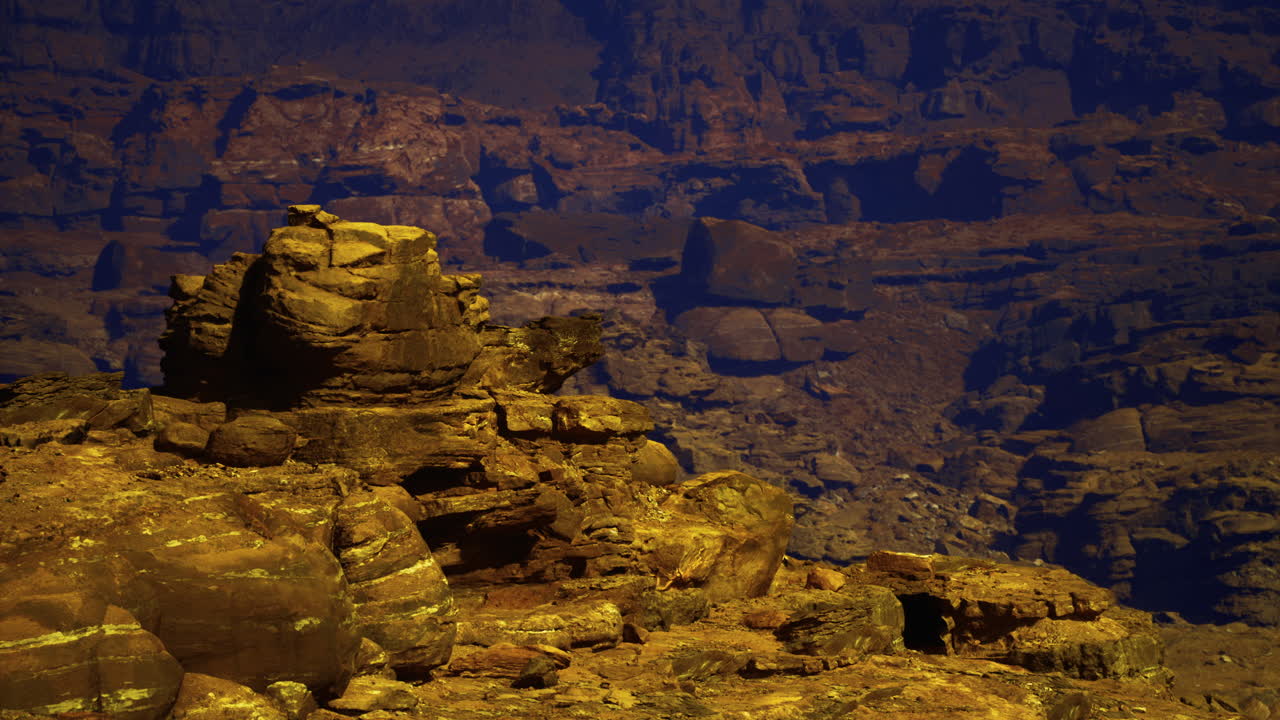 Unique rock formations illuminated by golden sunlight in the canyon