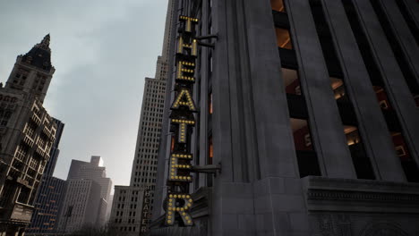 theater sign on city building at night