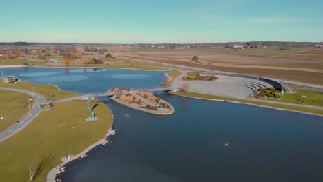 dji drone flying fast over artificial lake