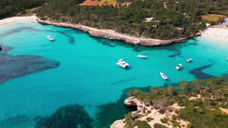 aerial view of serene cala mondrago beach in mallorca with crystal waters