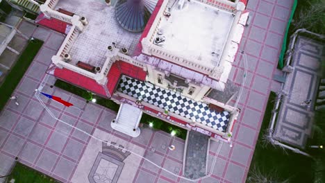 aerial view of the roof of the falabella palace, black and white marble tiles with round decorative window consistorial house of providencia