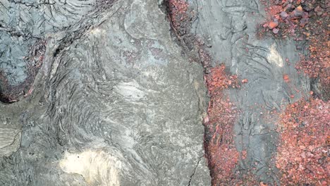 aerial: red and gray igneous rock formations, big island, hawaii