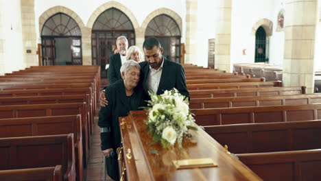 funeral, church and people hug by coffin