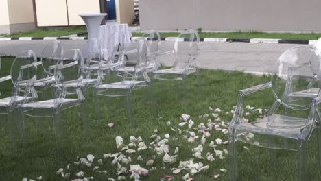 clear plastic chairs for outdoor wedding ceremony