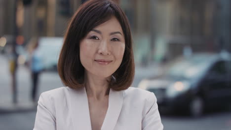 Slow-Motion-Portrait-of-beautiful-Japanese-businesswoman-smiling