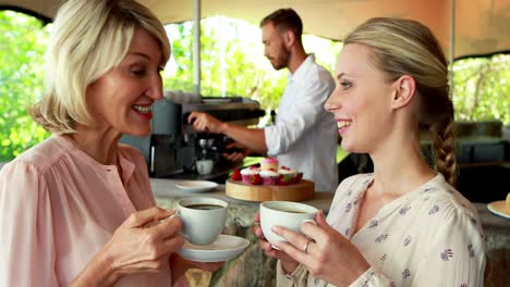 happy friends enjoying coffee together 4k