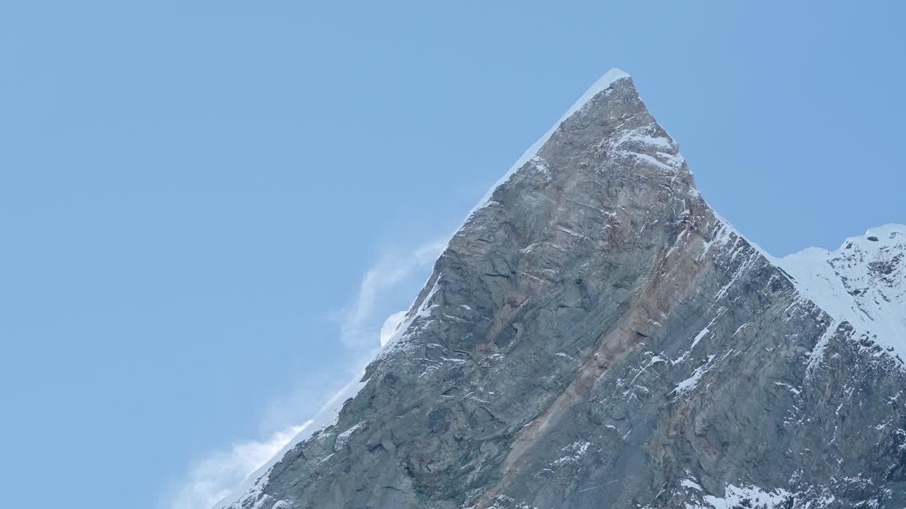 Pointy Mountain Summit and Blue Sky in Nepal, Mountain Face of Fishtail Mountains in Himalayas Mountains in Annapurna Mountain Range a Popular Hiking and Trekking Area in Nepal