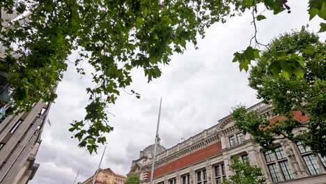 view of museum through tree branches