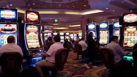 a vibrant night at the casino: gamblers enjoying the excitement of slot machines under neon lights and animations in a lively gaming hall
