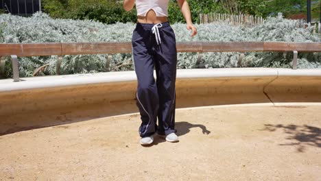 person wearing sport pants in outdoor setting