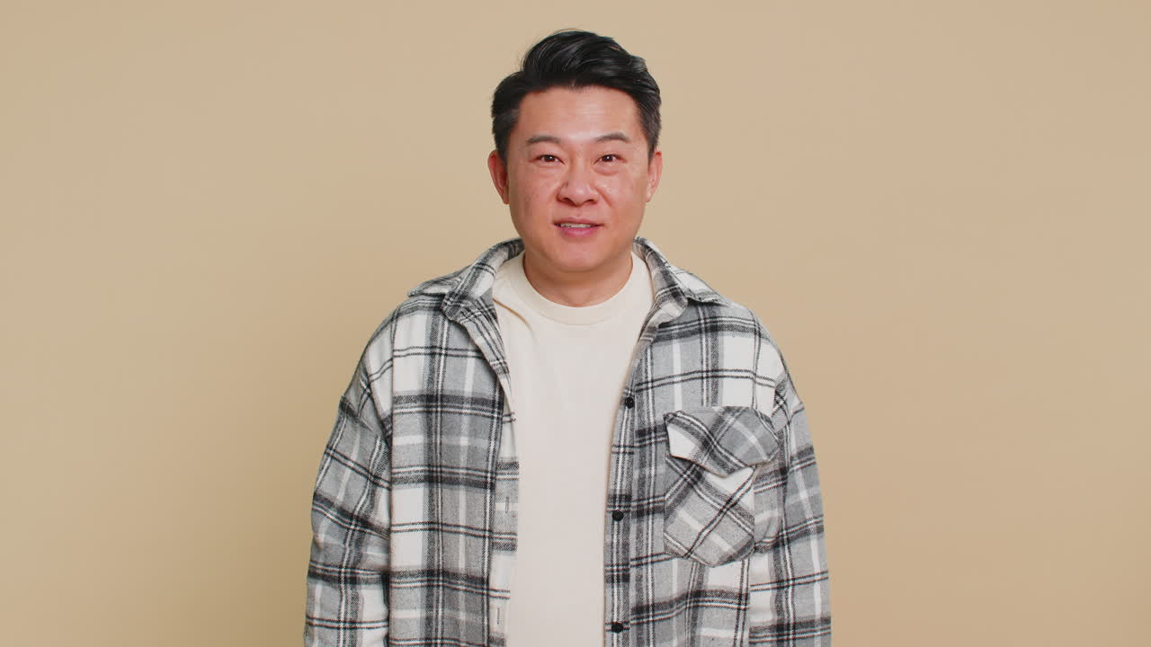 Happy mature man celebrating success winning victory lottery jackpot goal achievement good news