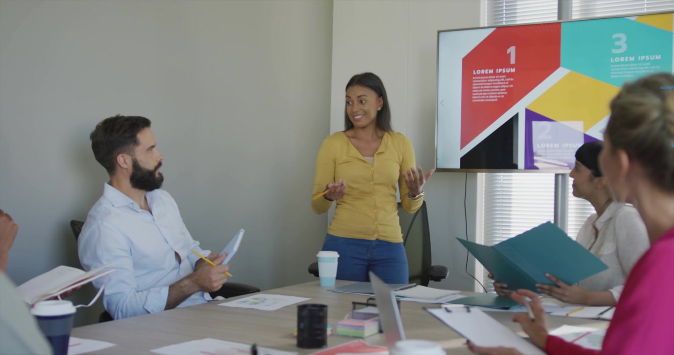 Presenter tapping screen during business meeting showing rising animated feedback metrics