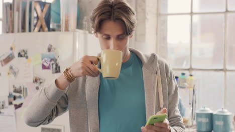 young student using smart phone at home in  morning drinking coffee