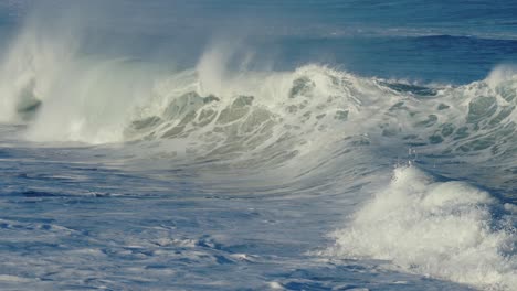 beautiful slow motion slo mo ocean waves crashing and breaking off the sea shore in hawaii