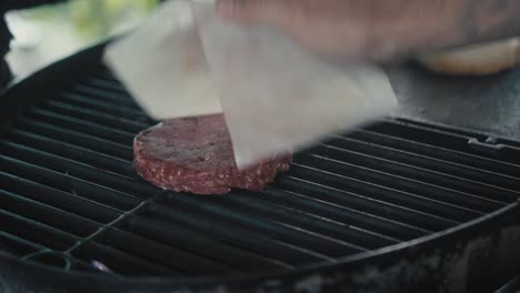 cooking a burger on the grill