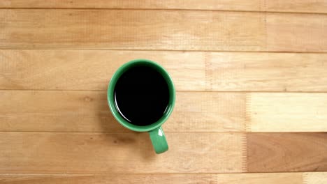 Close-up-of-green-coffee-cup