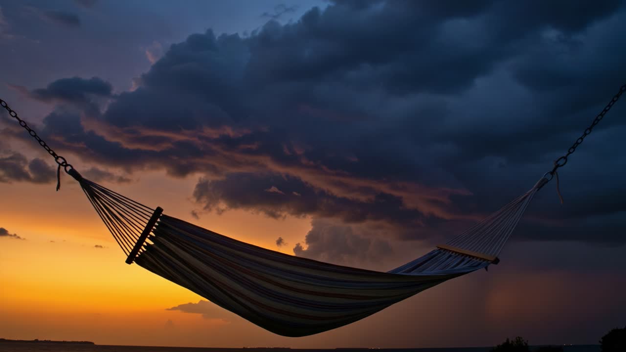 A Tranquil Evening: A Colorful Hammock Gently Swings Against a Dramatic Sunset Sky, as Dark Clouds Loom in the Horizon, Capturing the Essence of Serenity and Relaxation