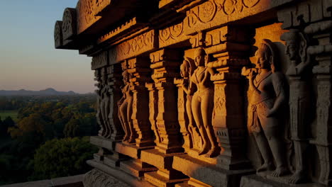 ancient indian temple carvings at sunset