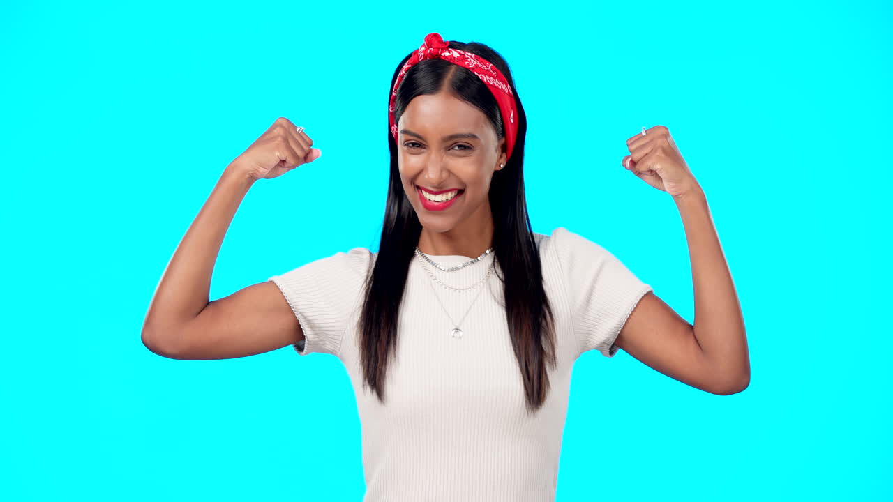 Flexing, empowerment and woman showing arm muscle