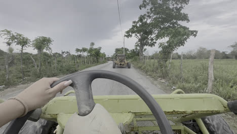 Person-Driving-Dune-Buggy-In-The-Countryside-Road---Adventure-Vehicle