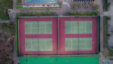 4-tennis-courts-in-use