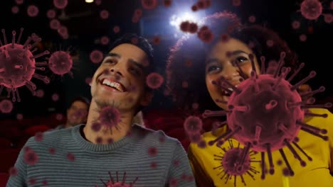 animación de células de covid 19 sobre personas en el cine
