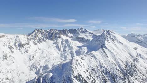 snowy mountain peaks aerial view