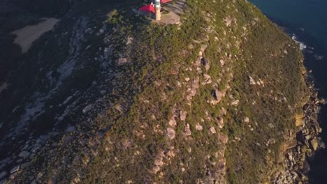 Bird-eye-view-of-Barrenjoey-Lighthouse-at-Palm-Beach,-Northern-Beaches-Sydney,-Australia