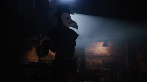 plague doctor in dark room