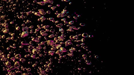 gold bubbles a black background