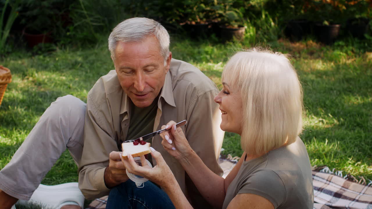 Happy Senior Couple Enjoying a Picnic