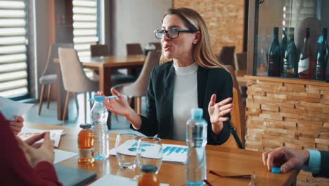 business woman professional manager shake hand of client making business deal at restaurant