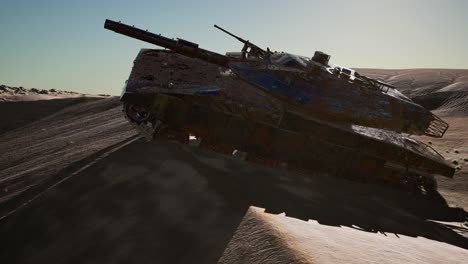 militairy tanks destructed in the desert at sunset