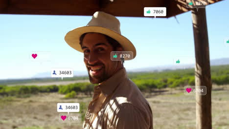 wearing hat outdoors, man with animation of social media like and heart icons