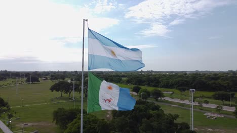 Aerial-orbit-of-stunning-Argentina-flag-waving-in-wind,-overcast-day