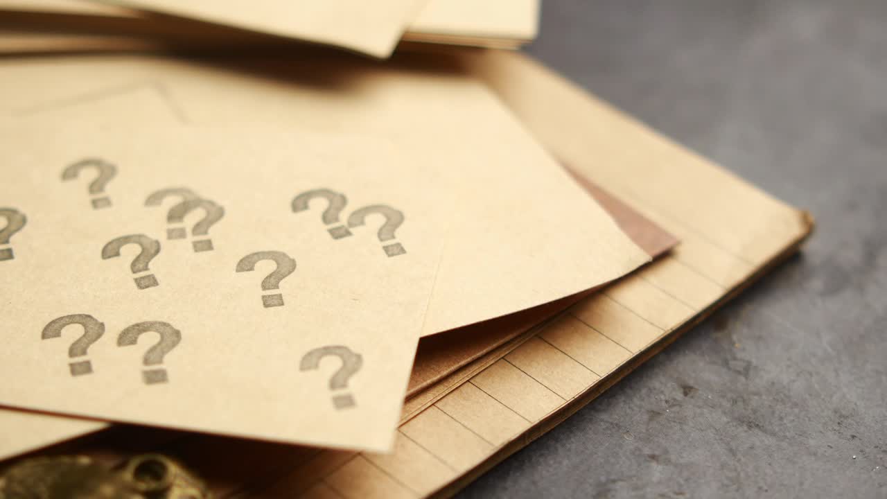 Stacked Envelopes with Question Marks