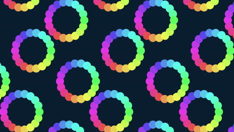 Colorful rainbow circle spiral seamless pattern on black background