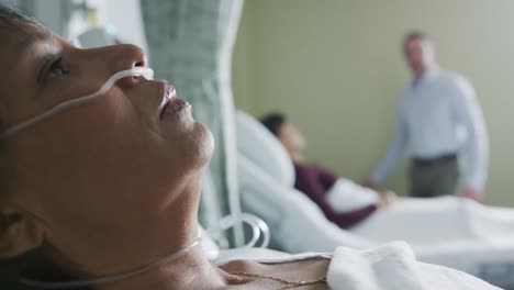 middle aged woman lying on hospital bed 4k