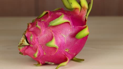 dragon fruit spins on a wooden table