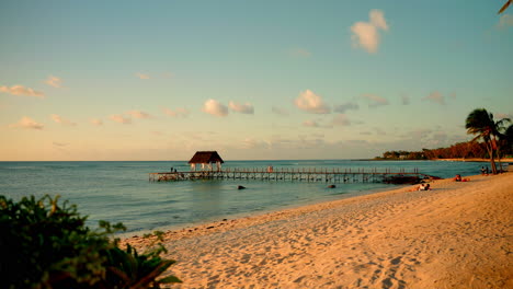 static wide shot of beautiful tropical empty beach at sunset