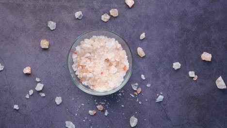 pink himalayan salt crystals in a glass bowl