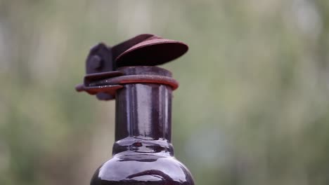 black diesel smoke puffs from equipment exhaust pipe, close up view