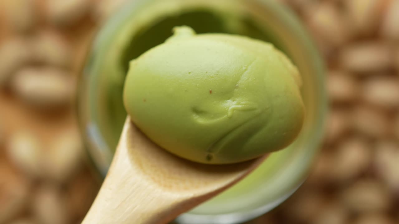 Pistachio Butter on Wooden Spoon