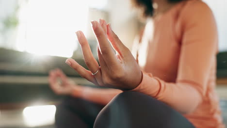 woman meditating indoors