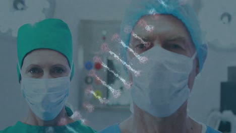 Animation-of-dna-strand-over-caucasian-surgeons-with-face-masks