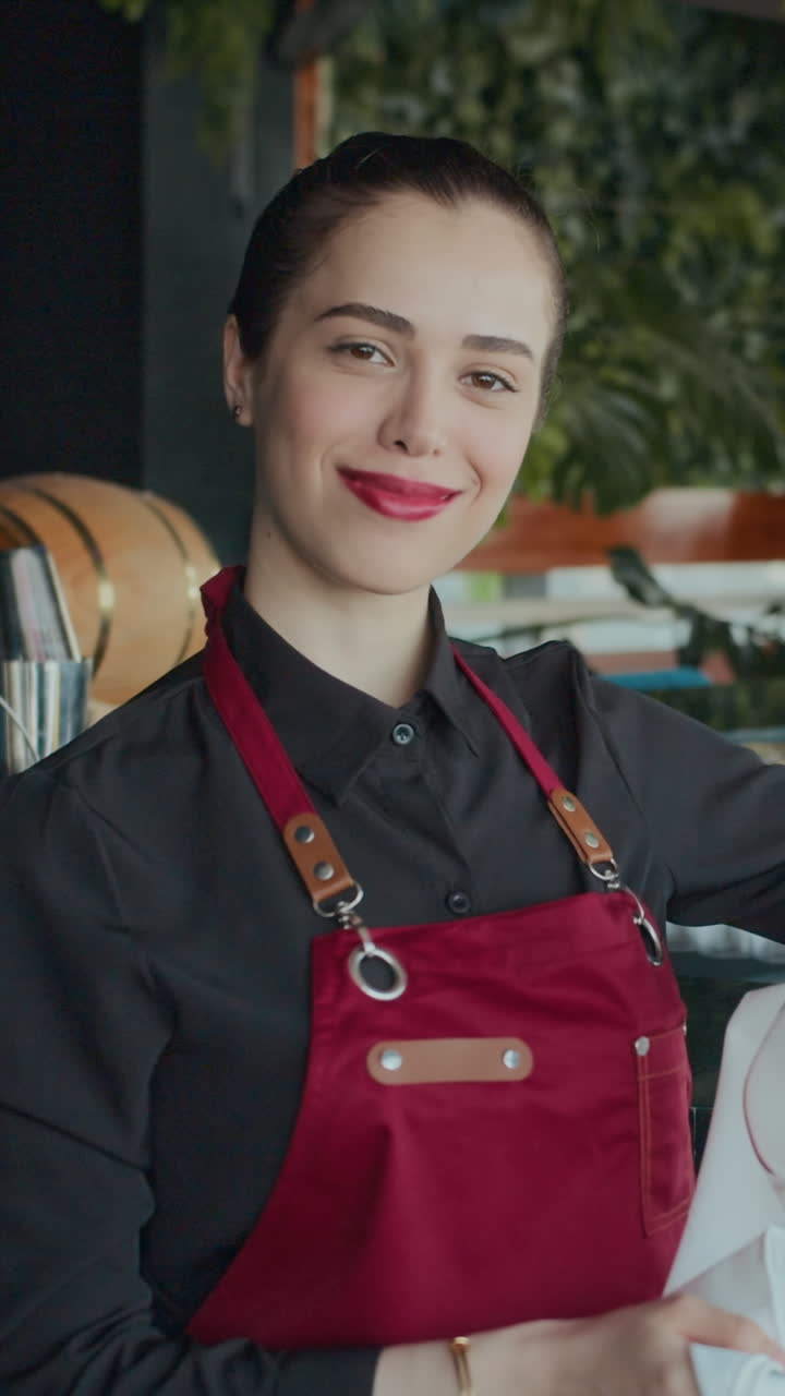 Waitress Posing at Camera near Bar Counter