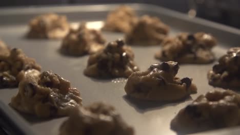 Chocolate-chip-cookies-time-lapse-baking-in-the-oven-with-camera-pan