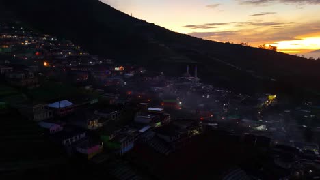 Aerial-view-of-hazy-morning-dawn-in-rural-landscape-of-Indonesia